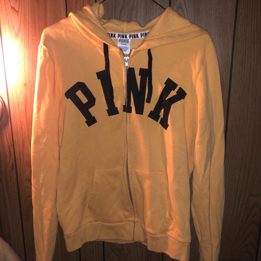 Yellow PINK hooded, zip-up sweatshirt.